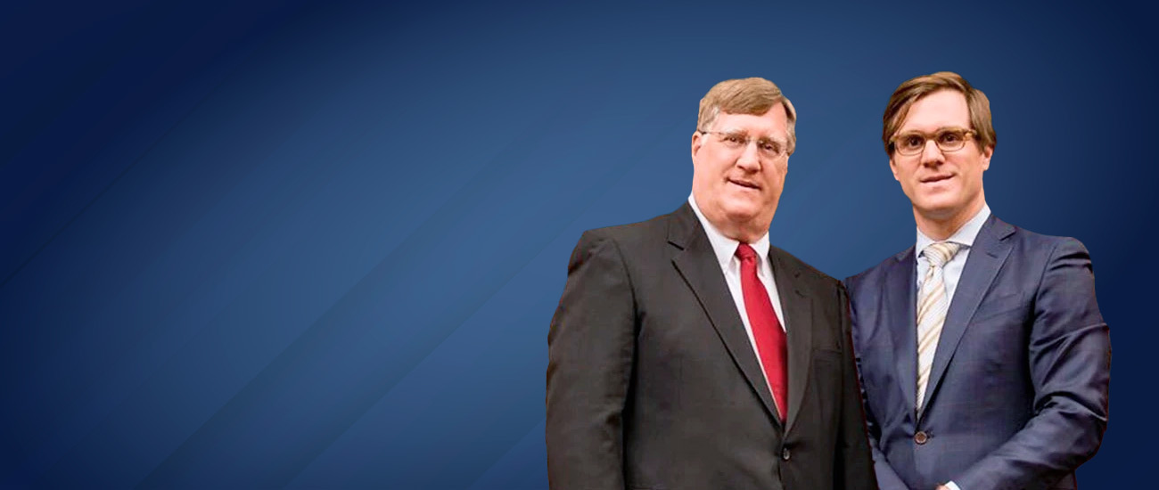 Attorneys at the firm with a blue background